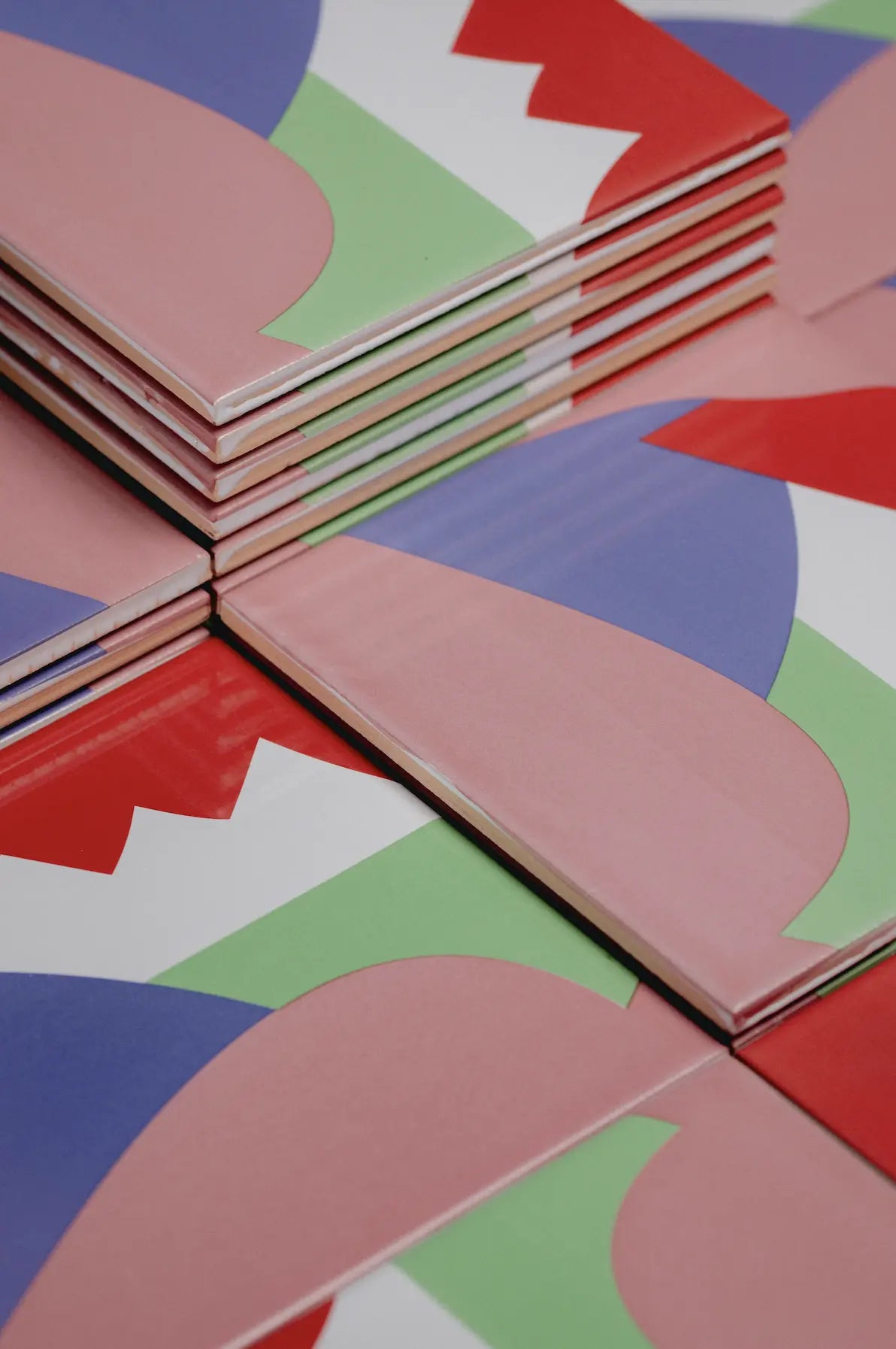 Angled shot of Abstract I ceramic tile by Clay with overlapping geometric shapes – on sale now at Clay