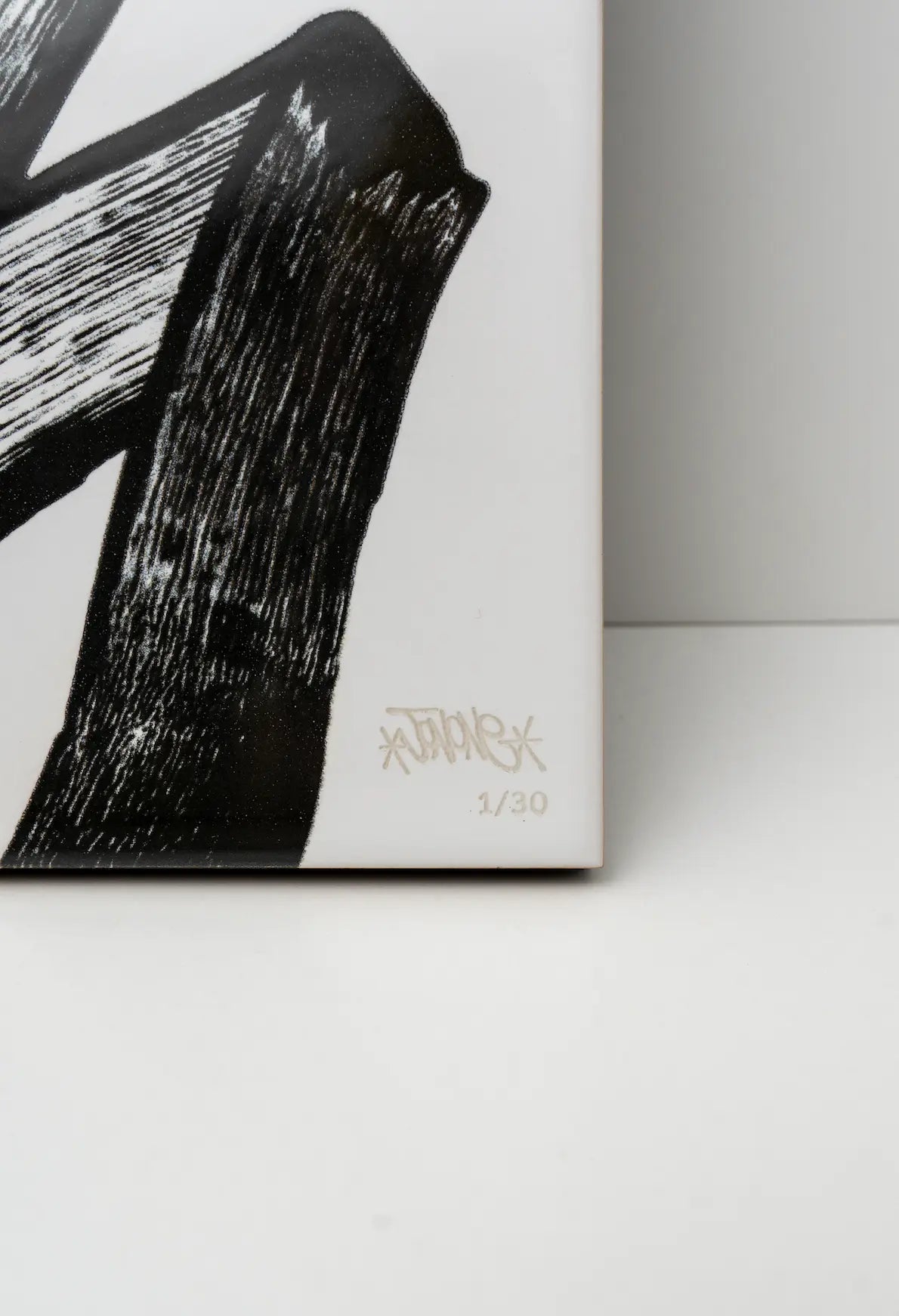 Artist signature on JonOne First Series ceramic tile by Clay – engraved and numbered limited edition, on sale at Clay
