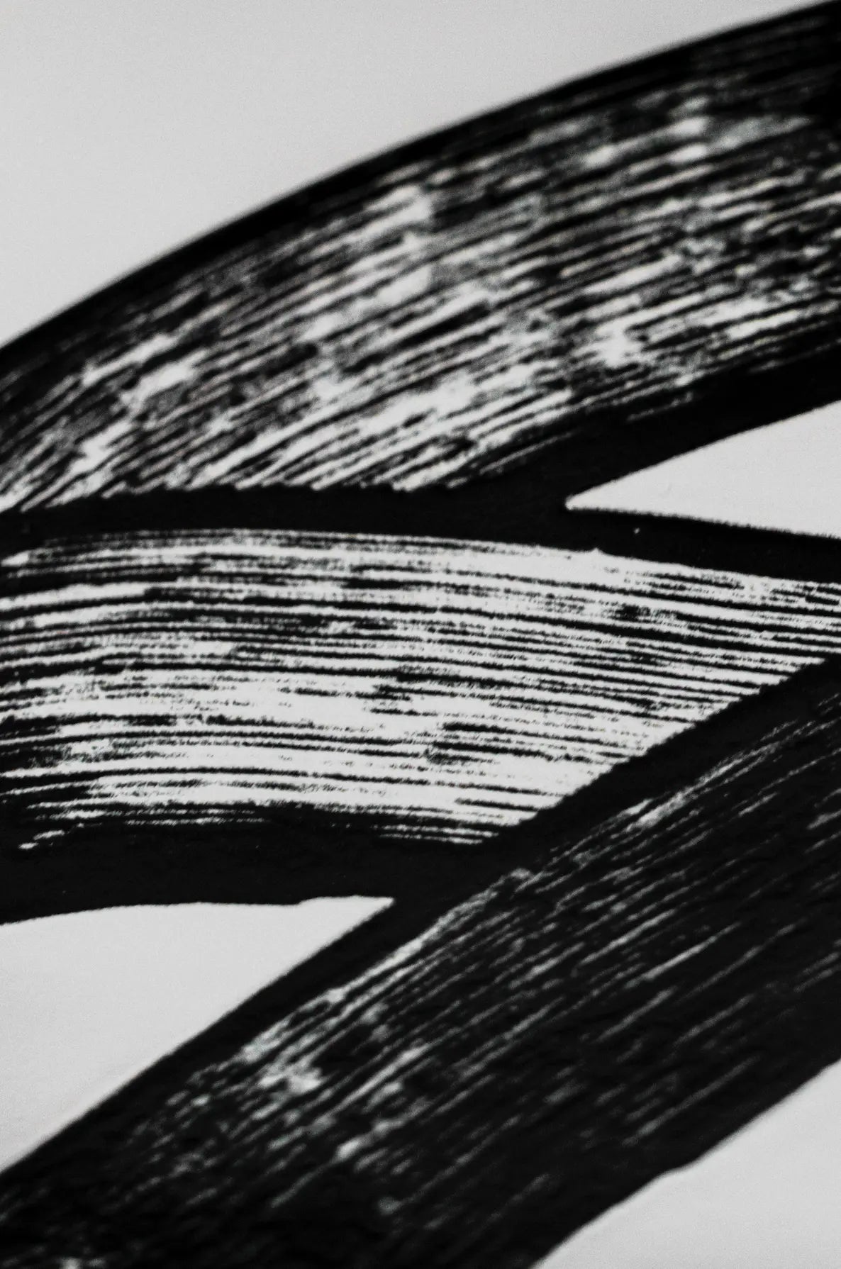 Close-up of JonOne First Series ceramic art tile by Clay showing bold black brushstrokes – shop now at Clay