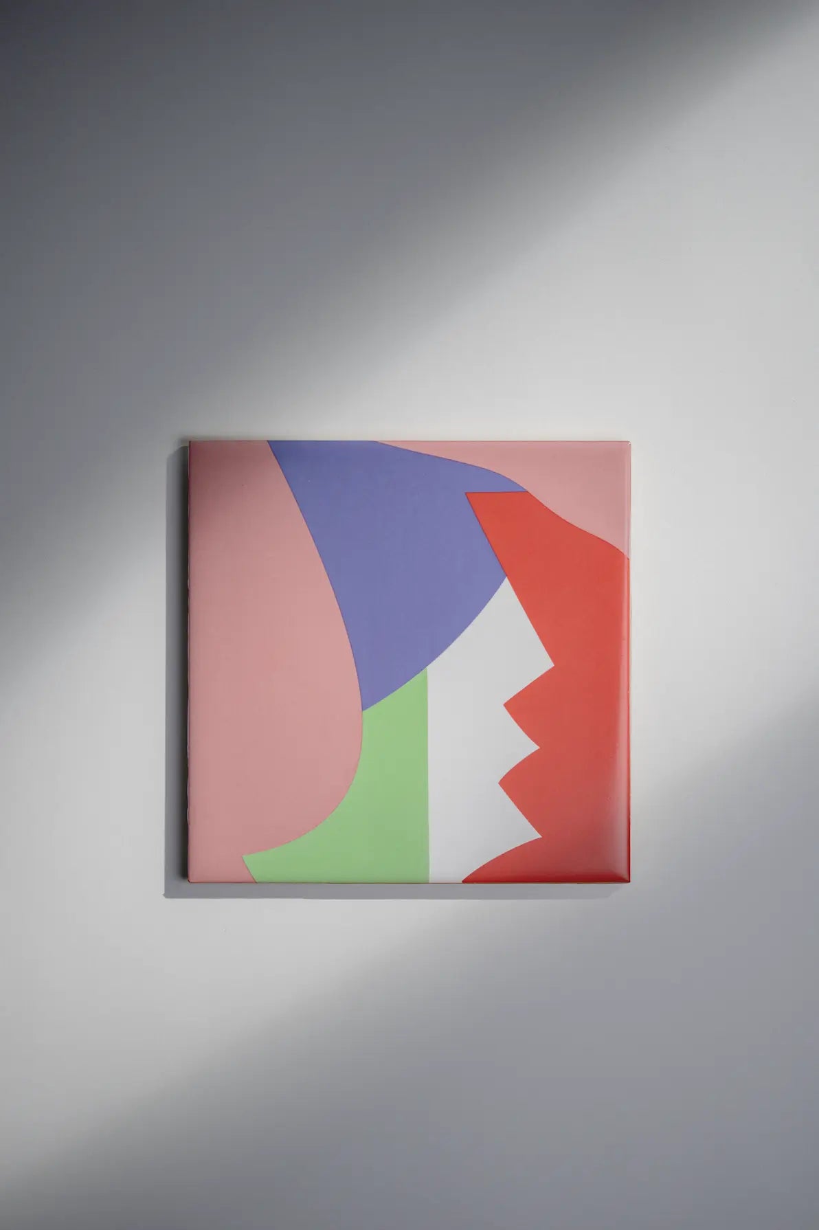 Pattern Aka Corleone ceramic art tile by Clay – bold red, green, purple, and pink geometric design, available on Clay