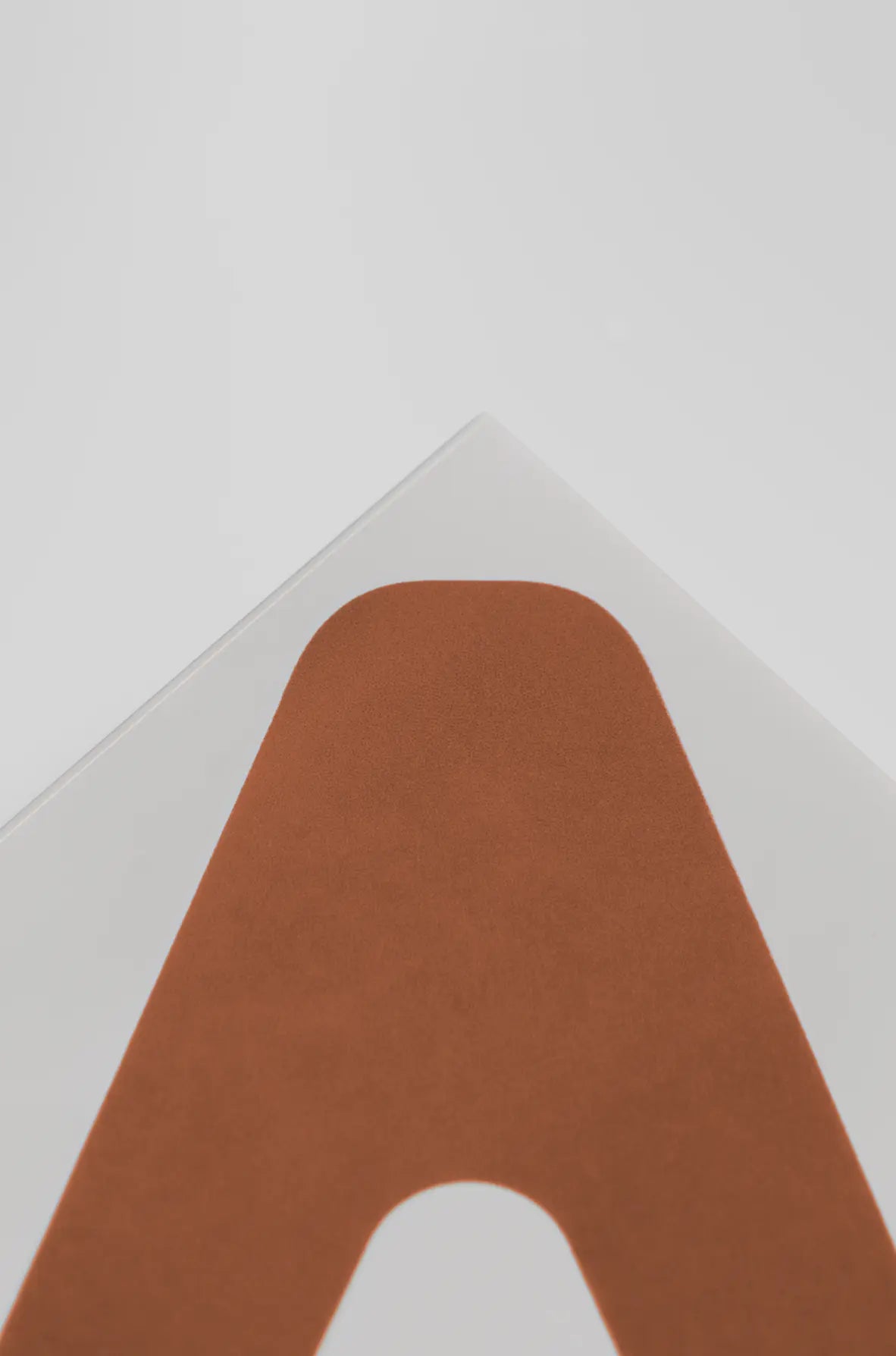 Close-up of Pattern Clay Originals 1 ceramic tile by Clay in terracotta orange – available on Clay