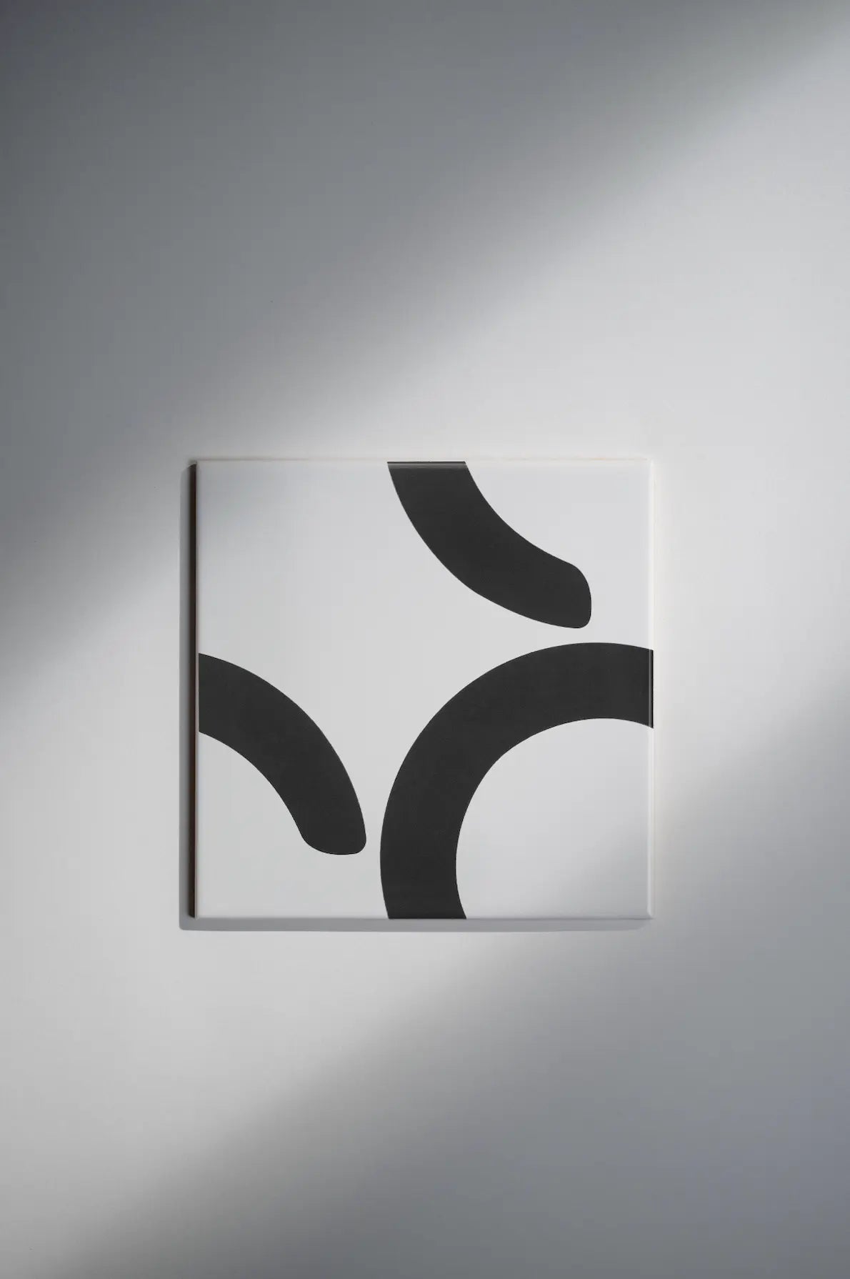 Pattern Clay Originals 2 ceramic tile by Clay featuring minimalist black curved pattern – available exclusively on Clay