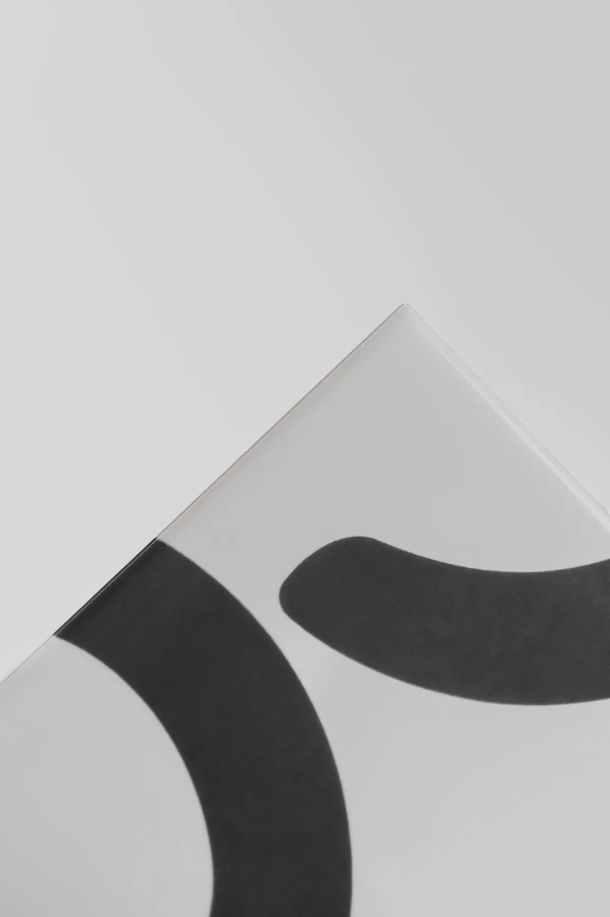 Angled view of Pattern Clay Originals 2 ceramic tile by Clay in light grey – shop now at Clay