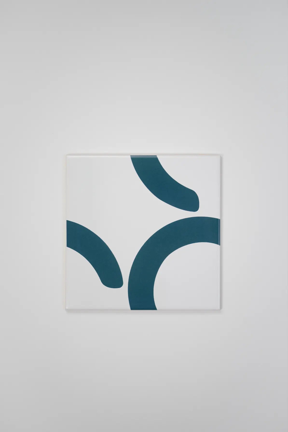 Pattern Clay Originals 2 ceramic art tile by Clay – bold teal curved design, available on Clay