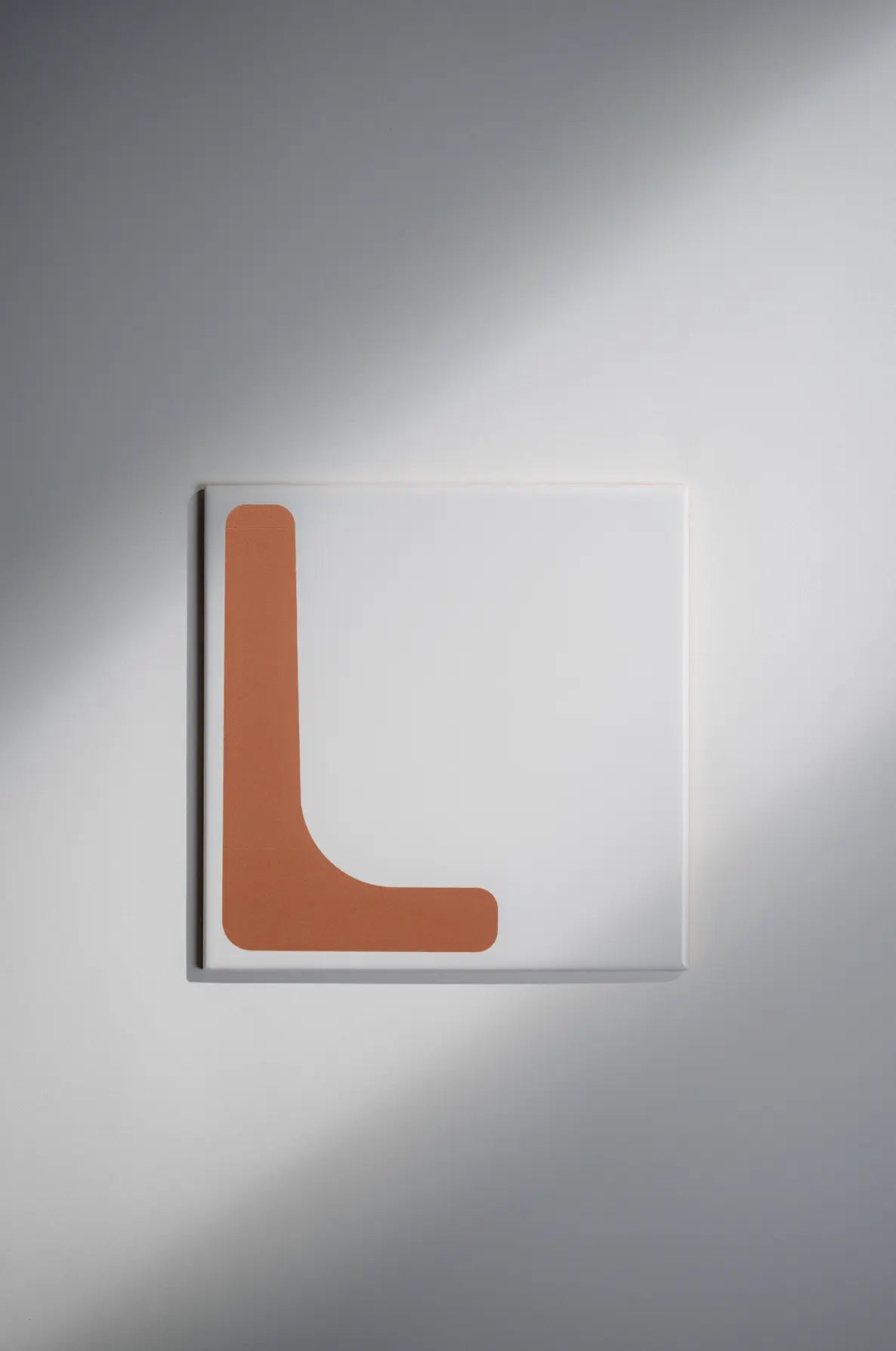 Pattern Clay Originals 3 ceramic tile by Clay in terracotta orange L-shaped design – on sale at Clay