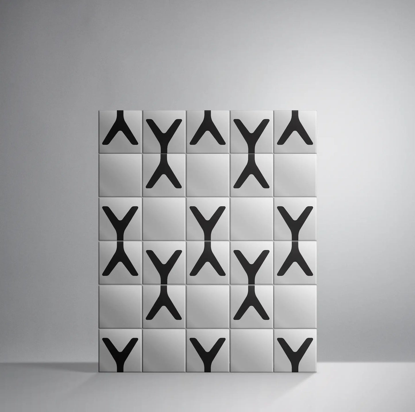 Set of Pattern Clay Originals 4 ceramic tiles by Clay arranged in black Y-shape grid – shop now at Clay