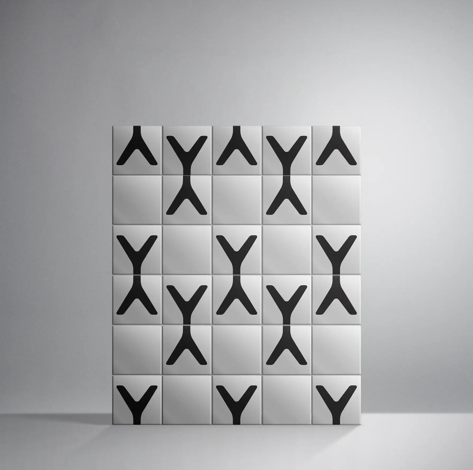 Set of Pattern Clay Originals 4 ceramic tiles by Clay arranged in black Y-shape grid – shop now at Clay