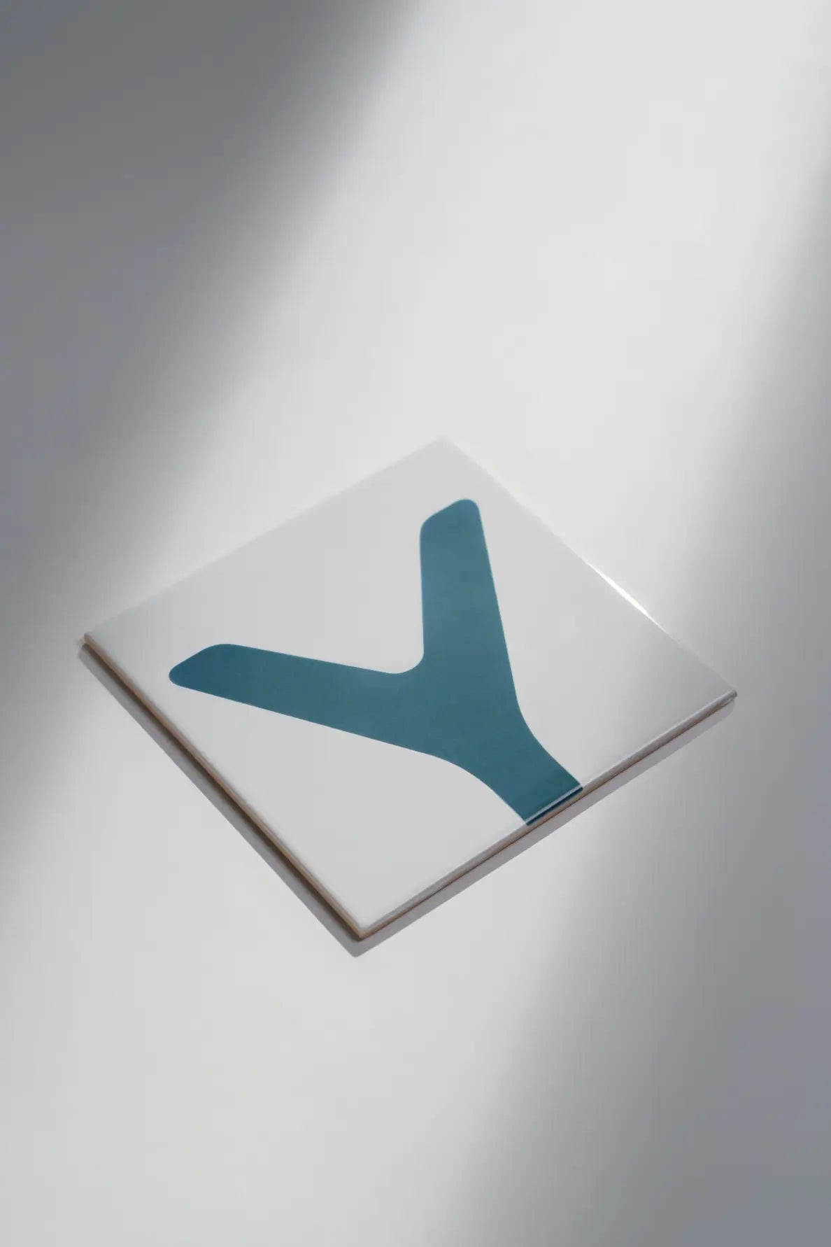 Pattern Clay Originals 4 ceramic art tile by Clay – bold teal Y-shaped design, available on Clay