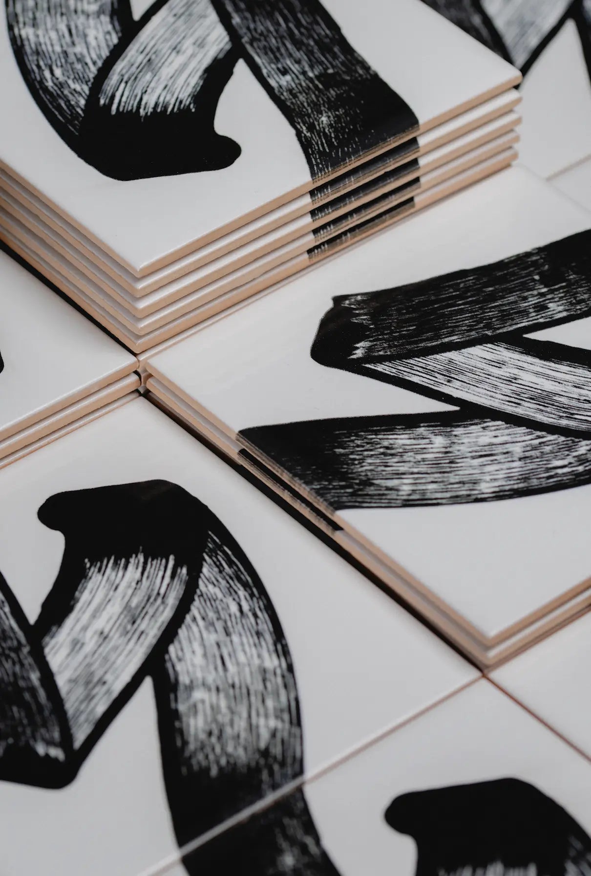 Angled detail of Pattern JonOne ceramic art tile by Clay with expressive brushstroke design – shop now at Clay