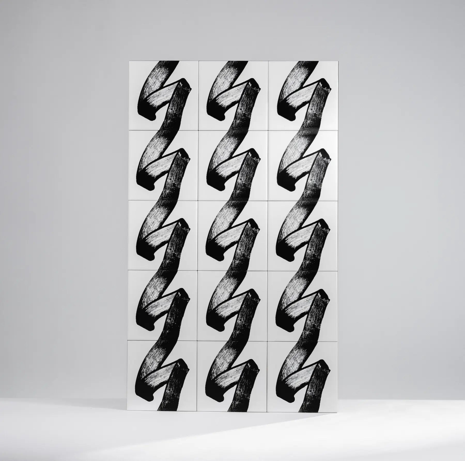 Back of Pattern JonOne ceramic tile by Clay with engraved brand mark – available exclusively on Clay