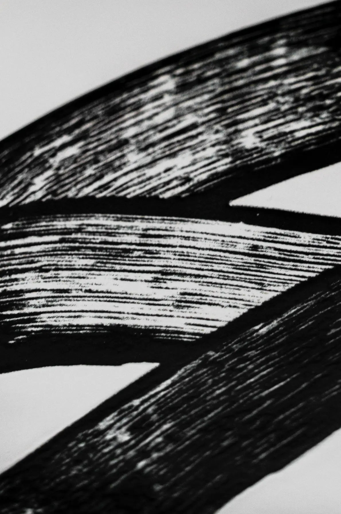 Close-up of Pattern JonOne ceramic tile by Clay showing detailed black brushstroke texture – available on Clay