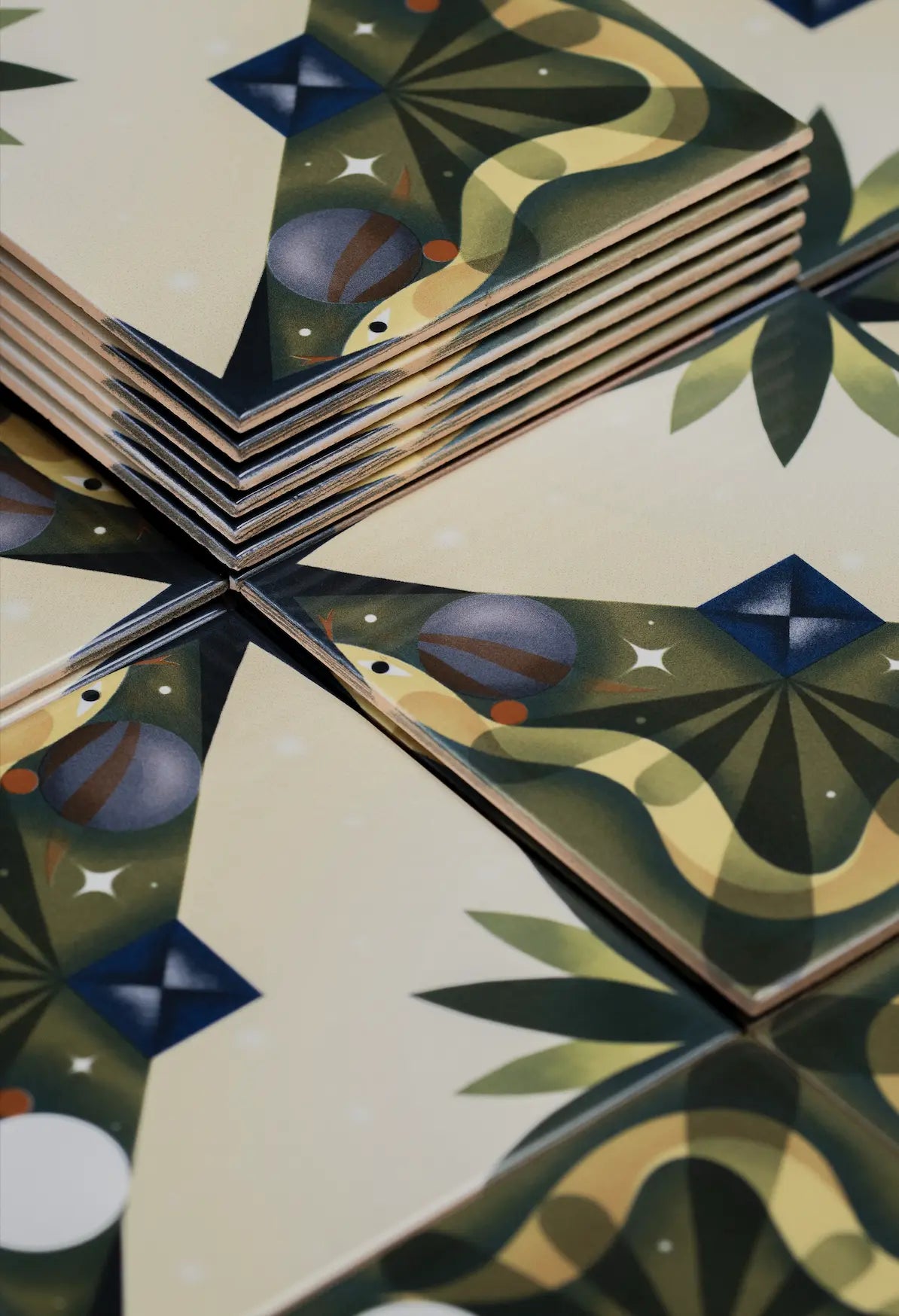 Close-up of Pattern Kruella D’Enfer ceramic tile by Clay highlighting star motif and organic curves – available exclusively on Clay